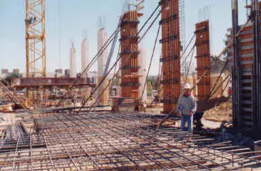 Soldier pile shoring and rebar during foundation construction