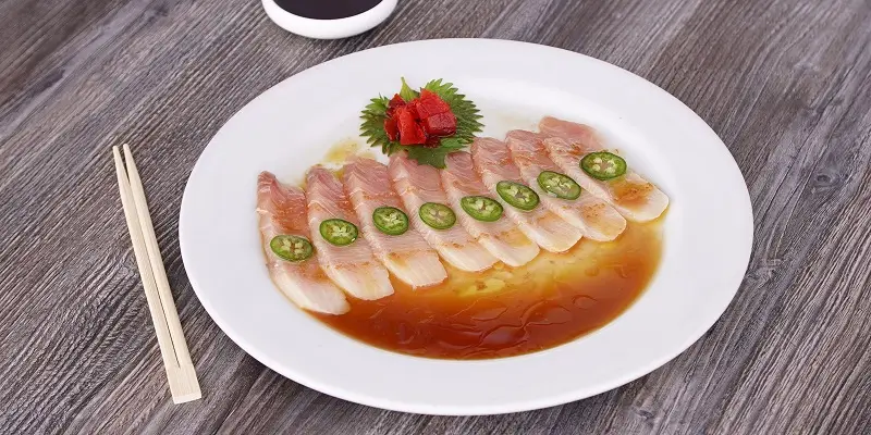 Yellowtail carpaccio with sliced jalapeño and yuzu ponzu