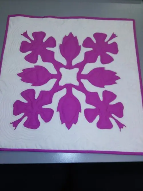 Pink Hawaiian appliqué quilt
