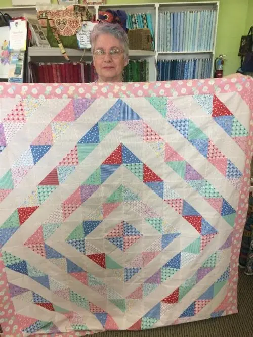 Pastel half-square triangle quilt