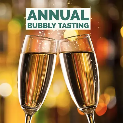 Two flutes of sparkling wine