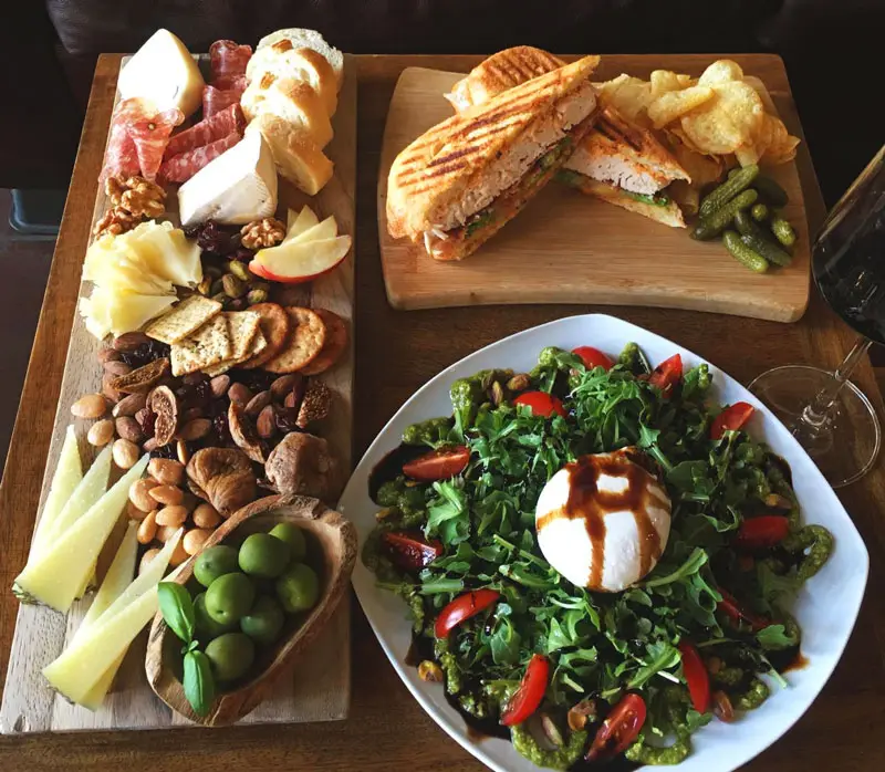 Charcuterie board, panini and burrata salad at The Wine Closet